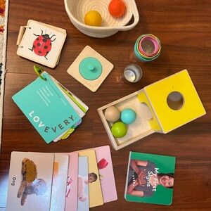Lovevery 7-8 month kit. Includes most pieces and an extra wooden book!